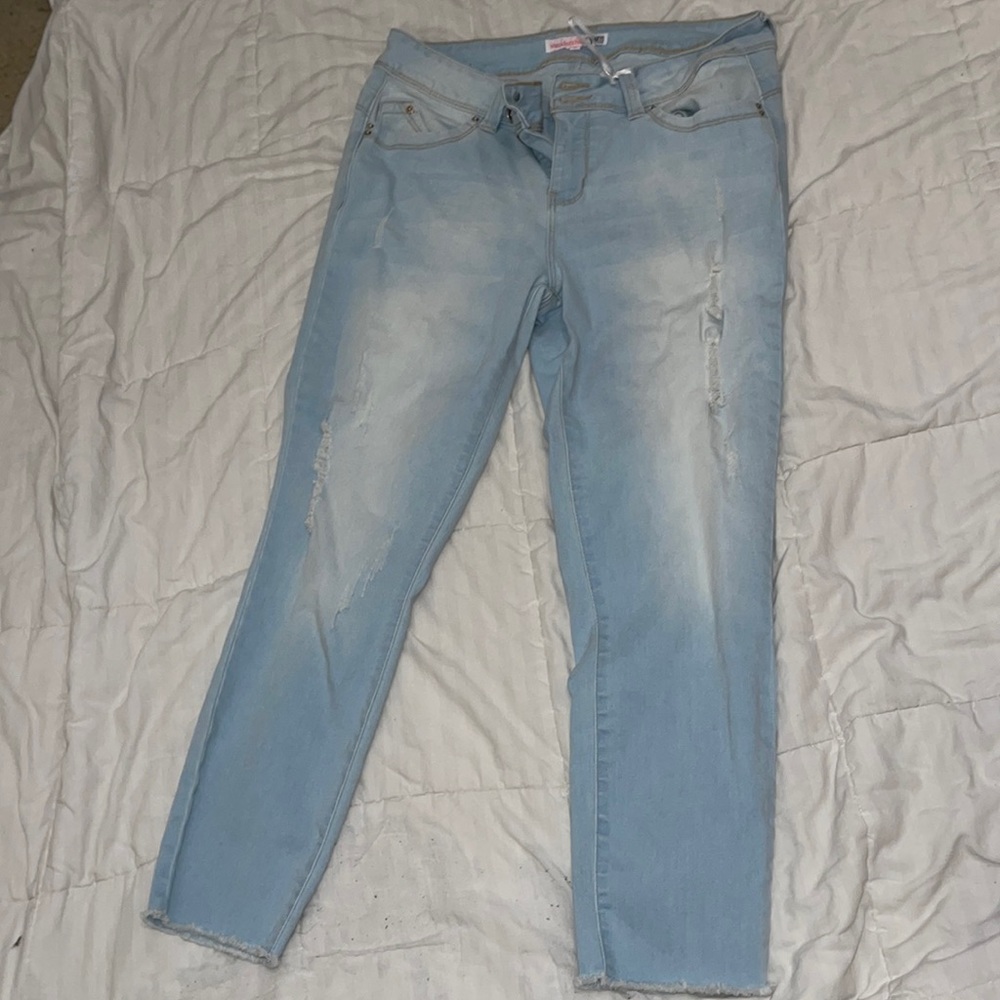 Light- washed semi ripped jeans